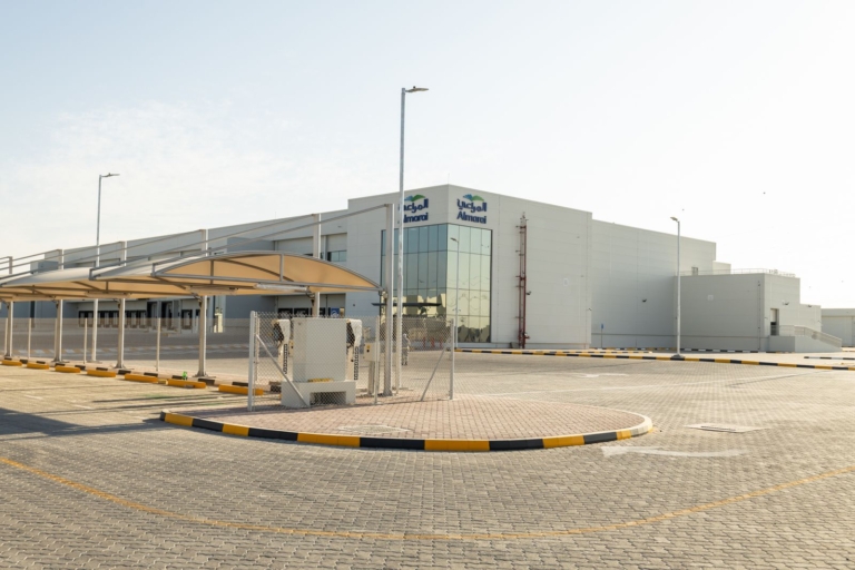 Group AMANA has been awarded the construction of the Almarai Logistics and Office Facility in ICAD 3, Abu Dhabi, a 52,000 sqm development designed to support Almarai's growing logistics and distribution operations. The facility will feature advanced warehousing, cold storage, and office spaces, incorporating pre-engineered steel structures, refrigeration systems, modern fire protection solutions, EV charging stations, and integrated smart building technologies.