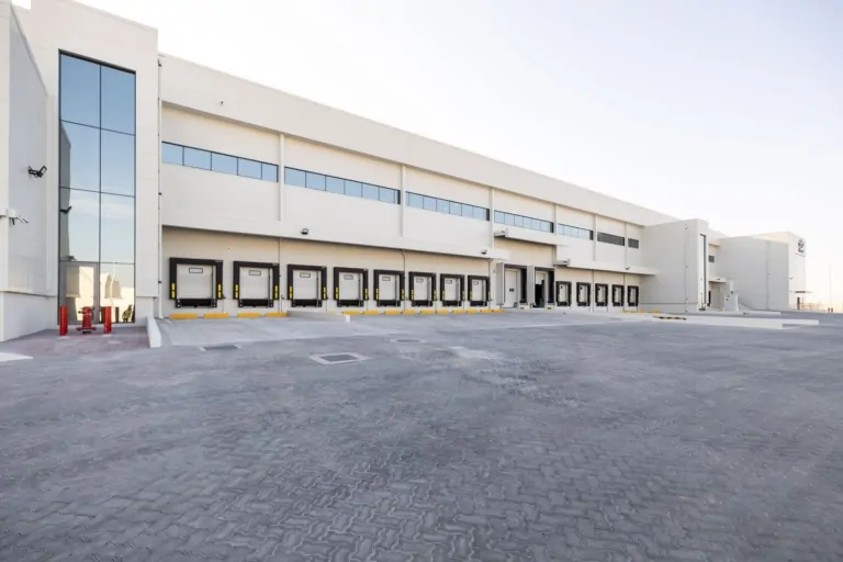 Group AMANA has been awarded the construction of the Almarai Logistics and Office Facility in ICAD 3, Abu Dhabi, a 52,000 sqm development designed to support Almarai's growing logistics and distribution operations. The facility will feature advanced warehousing, cold storage, and office spaces, incorporating pre-engineered steel structures, refrigeration systems, modern fire protection solutions, EV charging stations, and integrated smart building technologies.