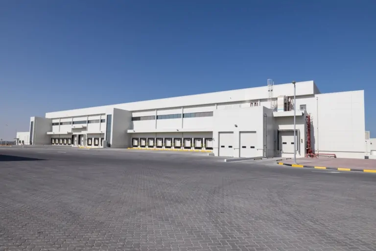 Group AMANA has been awarded the construction of the Almarai Logistics and Office Facility in ICAD 3, Abu Dhabi, a 52,000 sqm development designed to support Almarai's growing logistics and distribution operations. The facility will feature advanced warehousing, cold storage, and office spaces, incorporating pre-engineered steel structures, refrigeration systems, modern fire protection solutions, EV charging stations, and integrated smart building technologies.